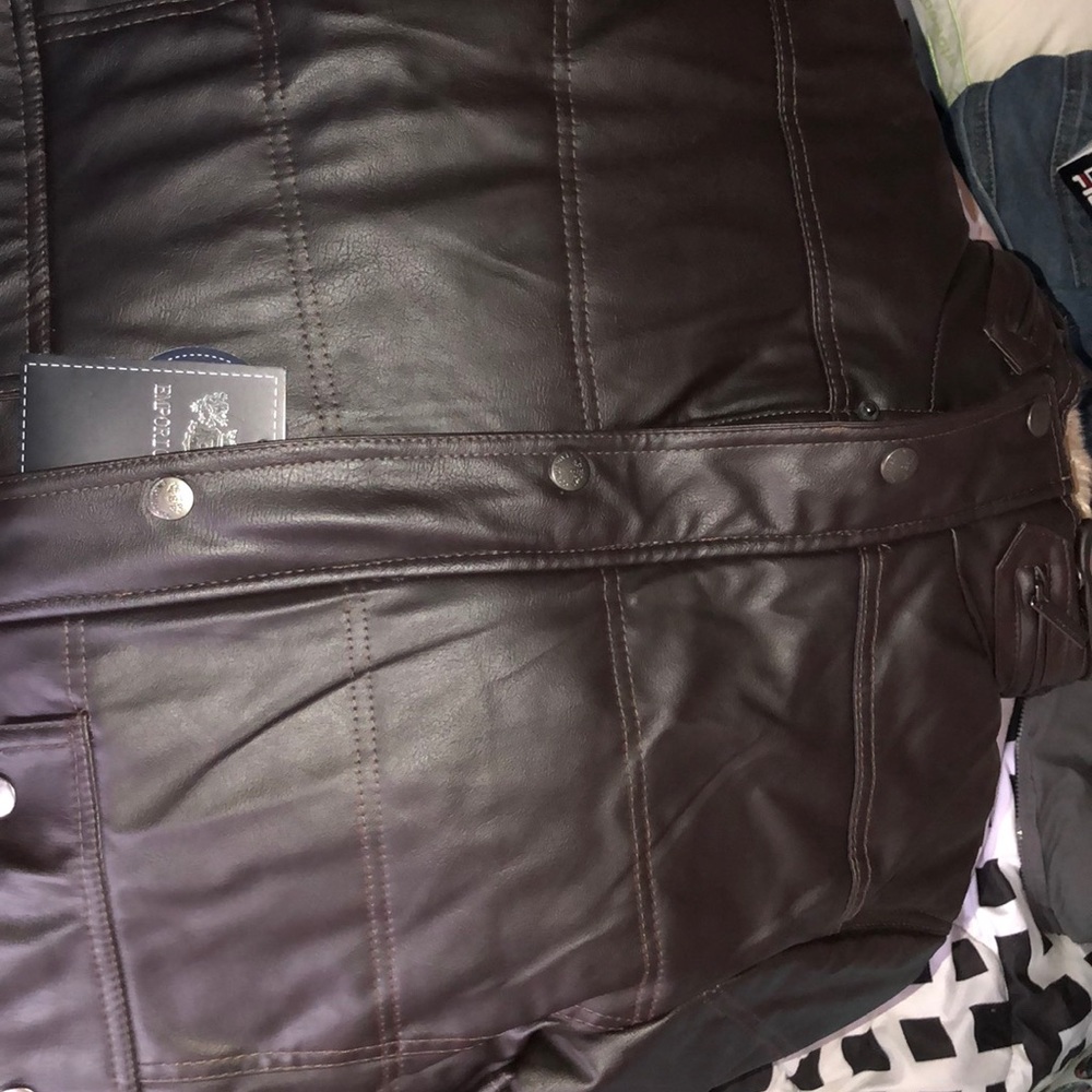 Women’s leather jacket with fur collar